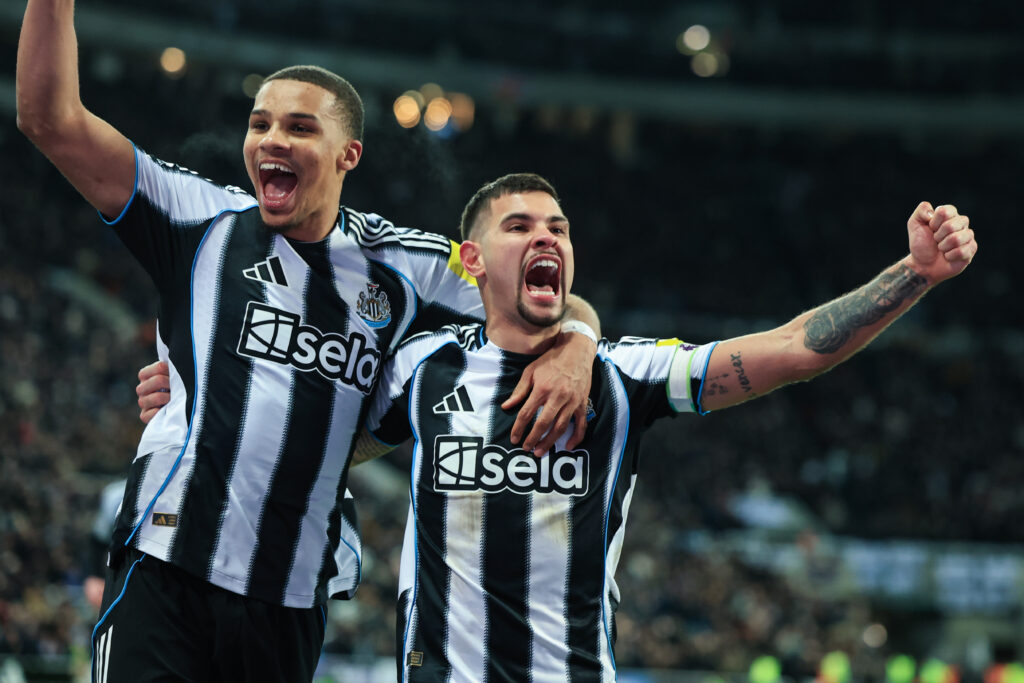 Malick Thiaw celebrates with Bruno Guimaraes after scoring for Newcastle United against Crystal Palace.