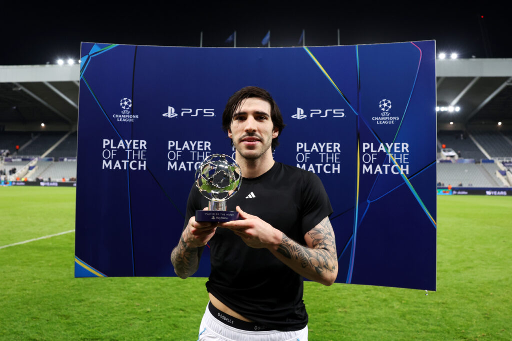 Sandro Tonali poses for a photo with the PlayStation Player Of The Match award after Newcastle United beat Qarabag in the Champions League.