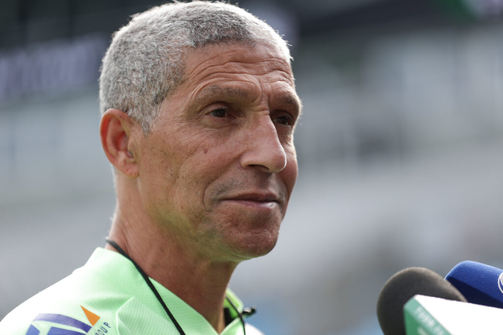 Chris Hughton speaks during a Ghana training session.