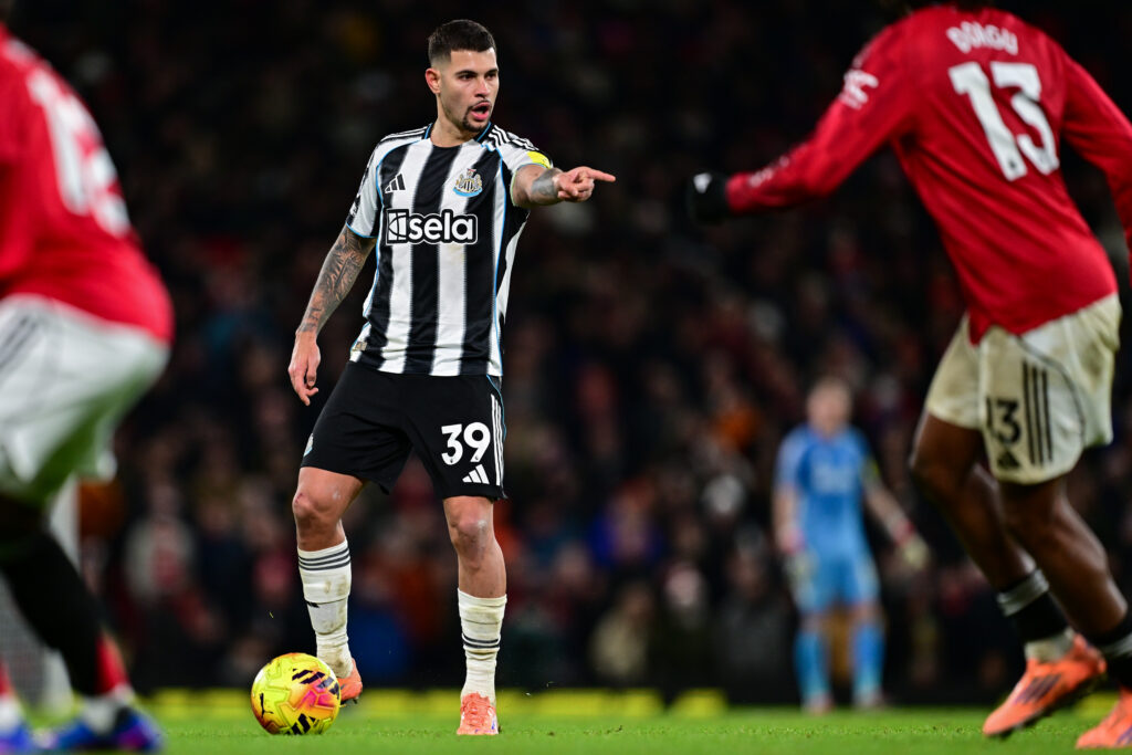 Bruno Guimaraes points his finger during Newcastle United's Premier League match against Manchester United.
