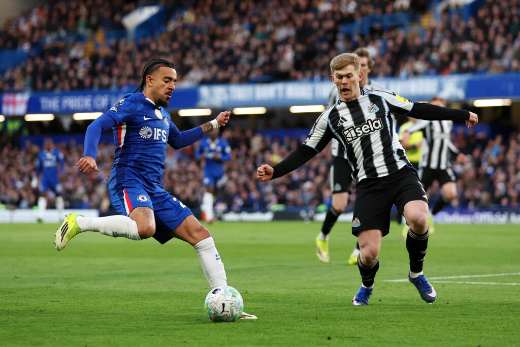 Lewis Hall blocks a cross from Malo Gusto during Chelsea vs Newcastle United.