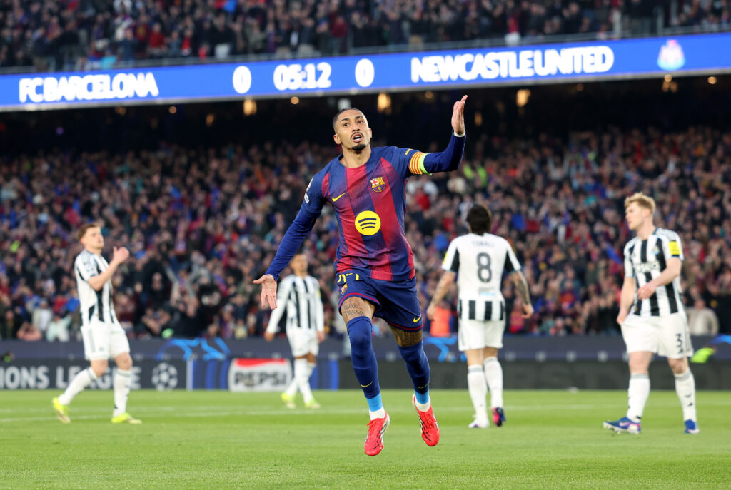 FC Barcelona forward Raphinha celebrates after scoring against Newcastle United in the Champions League.