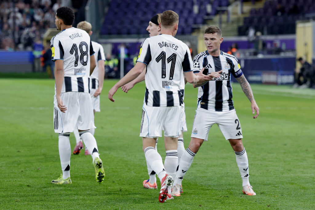 Kieran Trippier celebrates with Harvey Barnes after Newcastle United score against Royale Union SG in the Champions League.